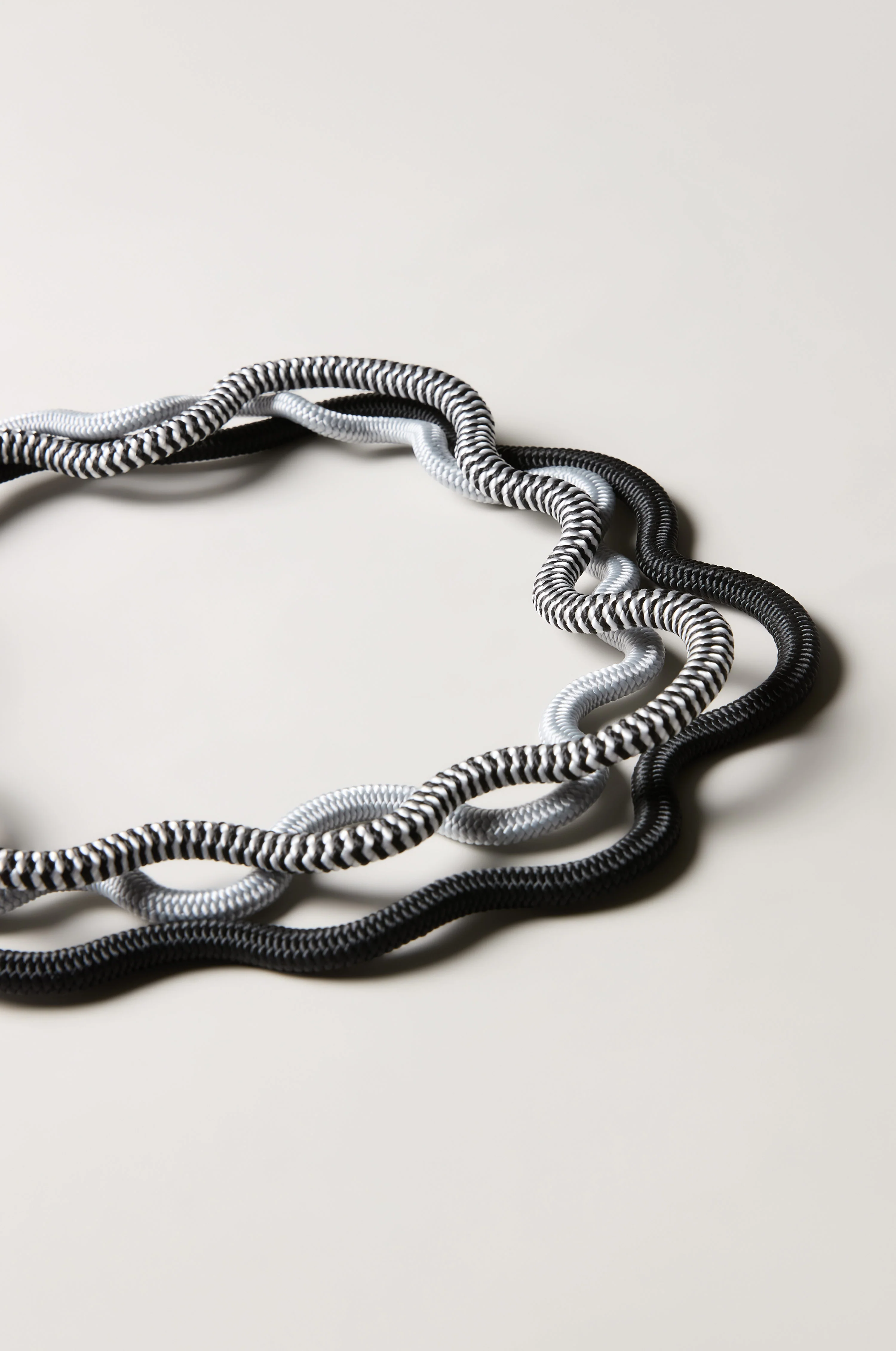 Black and White Monochrome Cord Waves Necklace - Image 3